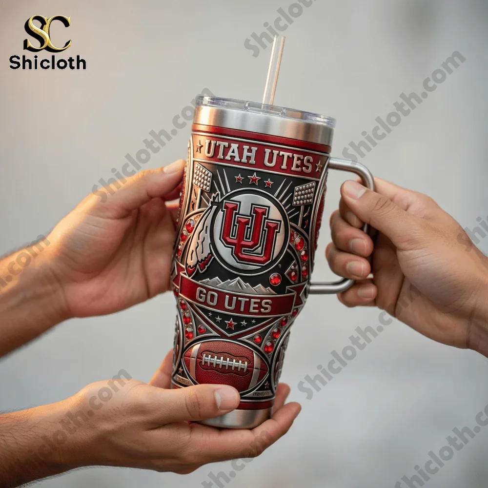 Utah Utes Go Utes 40oz Tumbler With Handle 4 Two hands holding Utah Utes tumbler close view