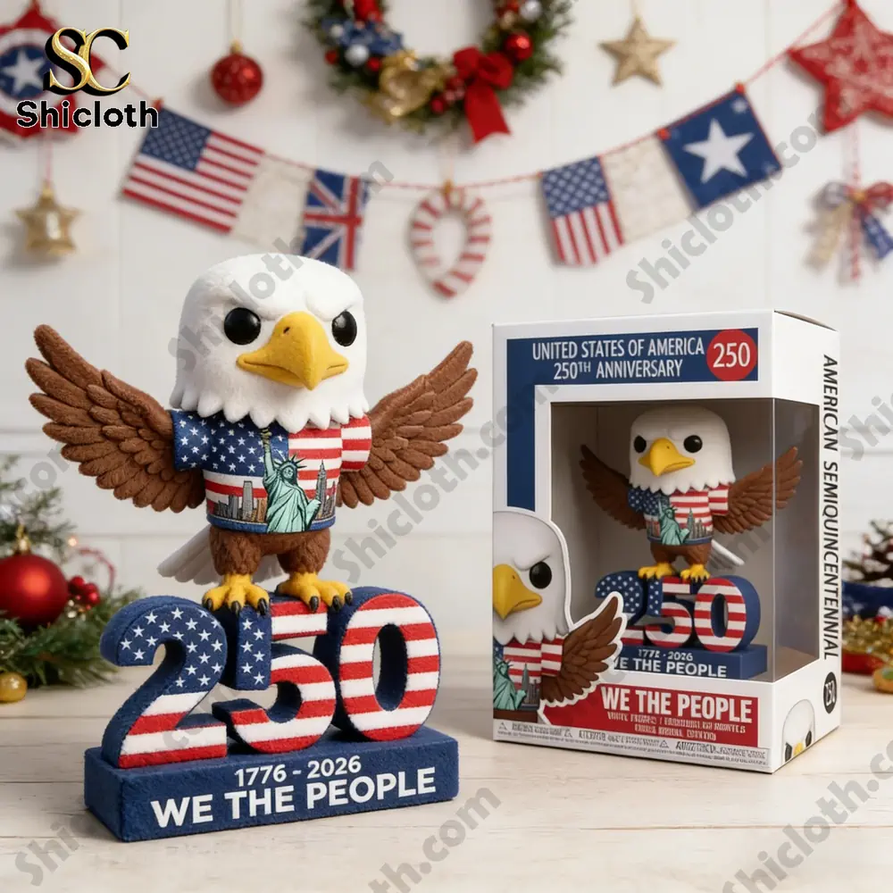 Patriotic eagle anniversary figure with We The People base beside product box in festive decorated room by Shicloth!