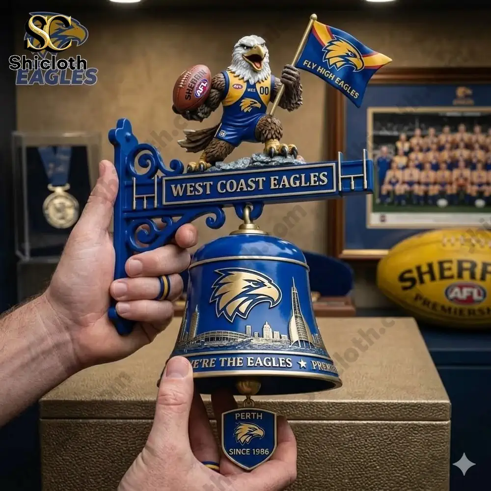 West Coast Eagles wall bell with eagle mascot held by hands in sports display room!