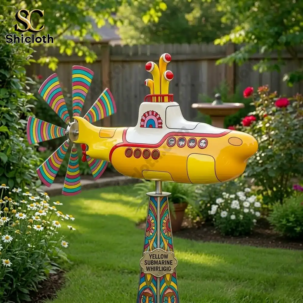 Yellow submarine wind spinner in green garden with flowers