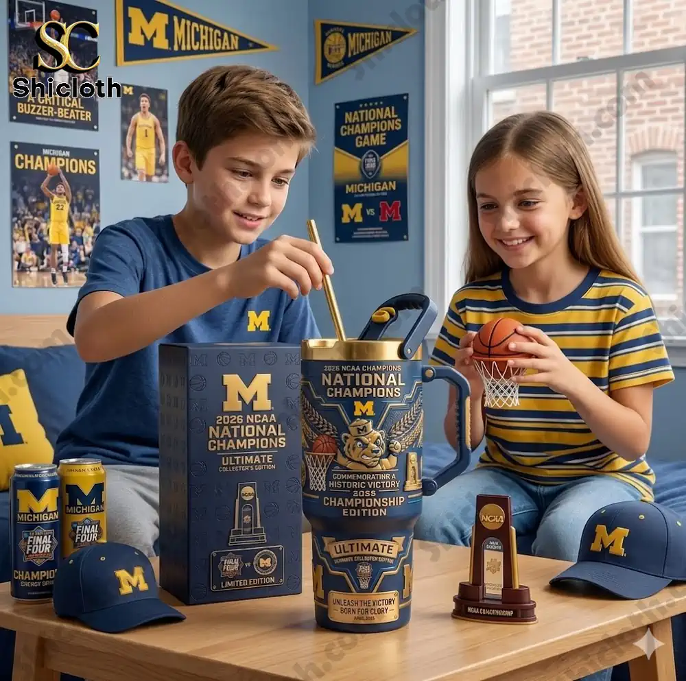 Children holding Michigan basketball champion mug and collectibles!