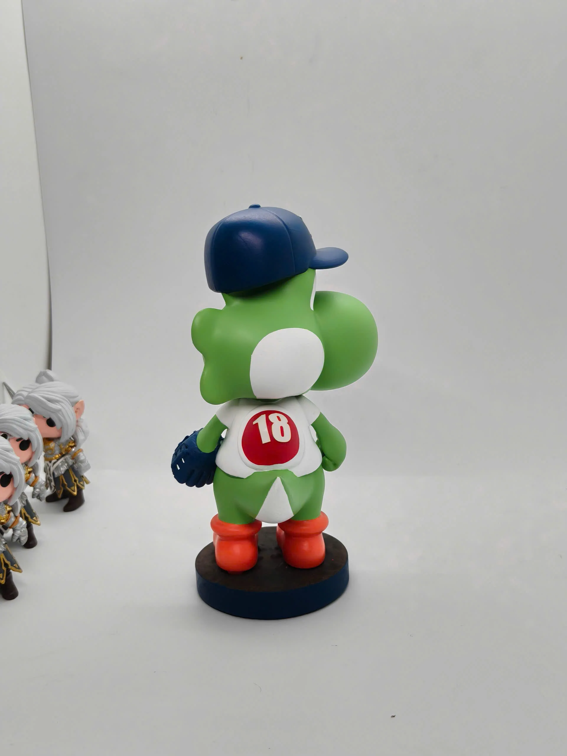 Back view of green Yoshi Dodgers figure with jersey number eighteen!