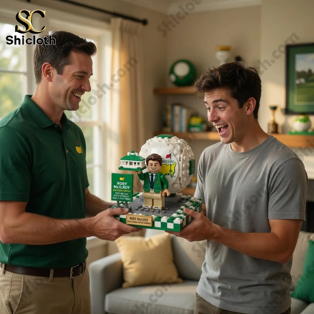 Two men smiling while gifting Rory McIlroy brick model at home!