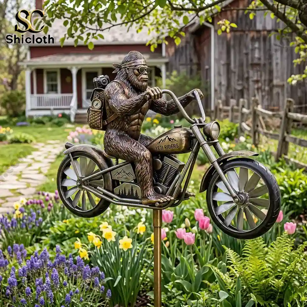 Yeti riding a motorcycle statue displayed in a colorful garden!