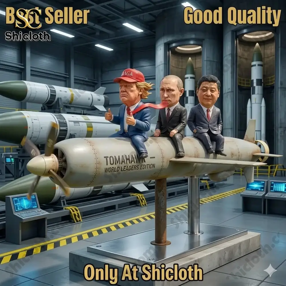 Three leader figures on a missile displayed inside a factory setting!