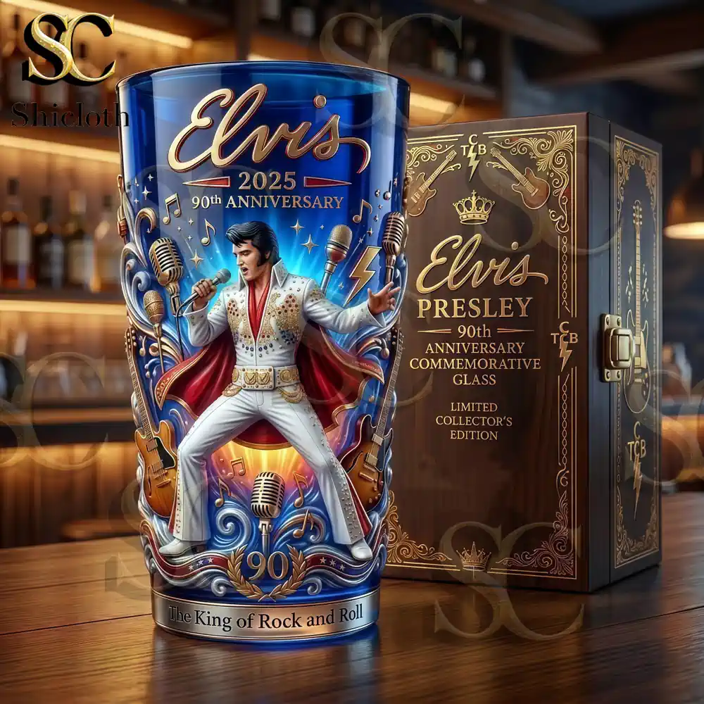 A highly detailed blue commemorative glass and its carved wooden box featuring Elvis Presley 90th anniversary art on a bar top!