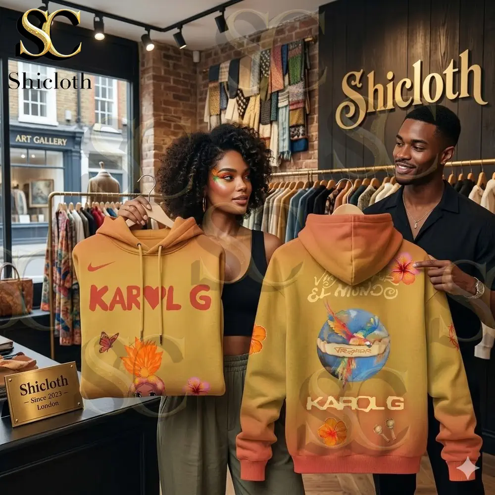 Two people holding Karol G hoodie in Shicloth fashion store