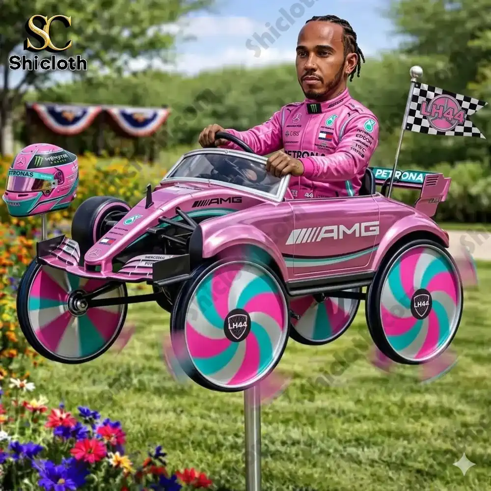 Pink racing car wind spinner with driver figure on garden stake