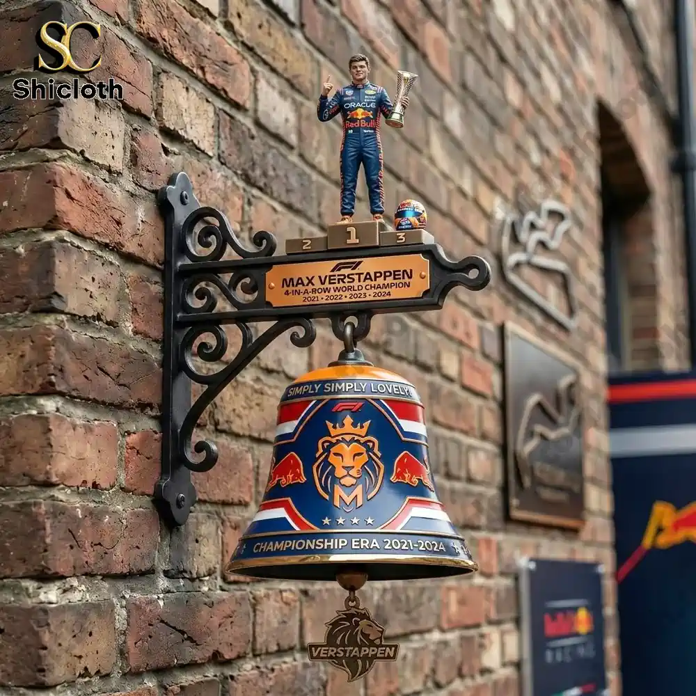 Max Verstappen themed wall bell mounted on a brick wall