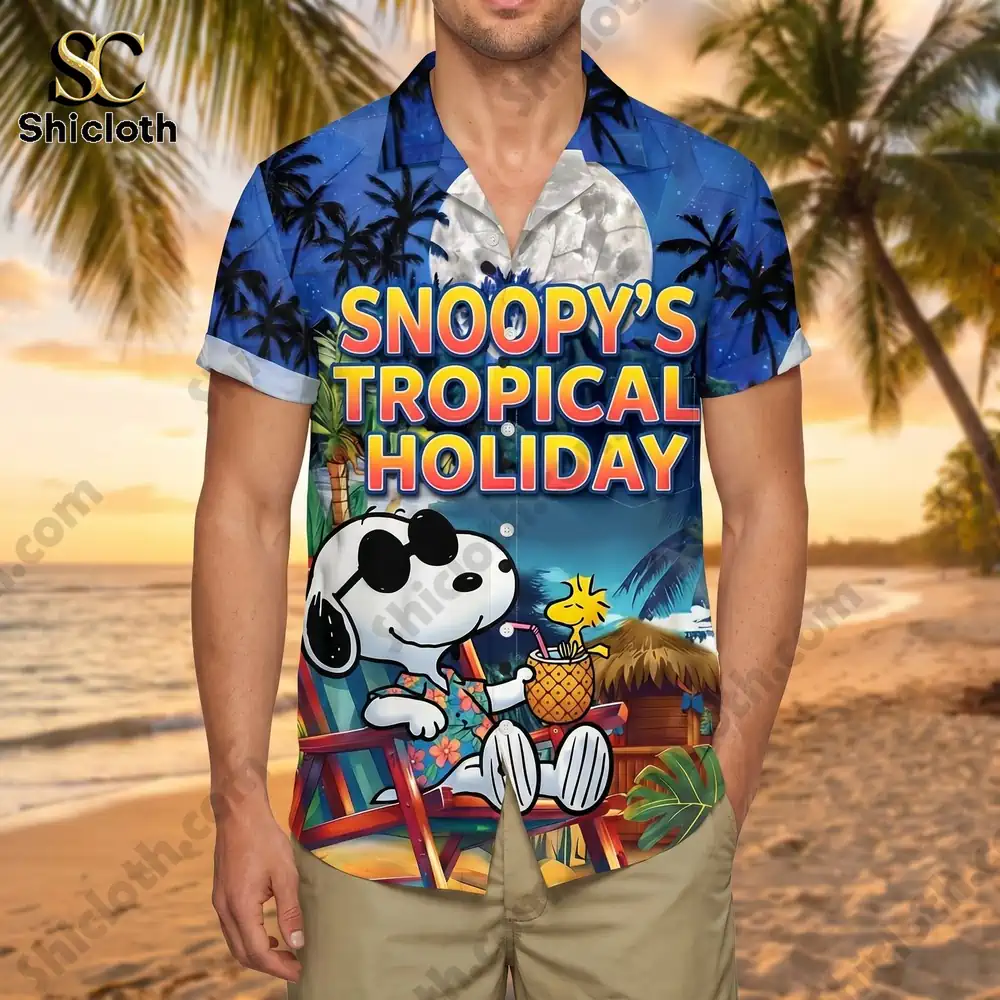 Man wearing Snoopy tropical Hawaiian shirt on sunny beach!