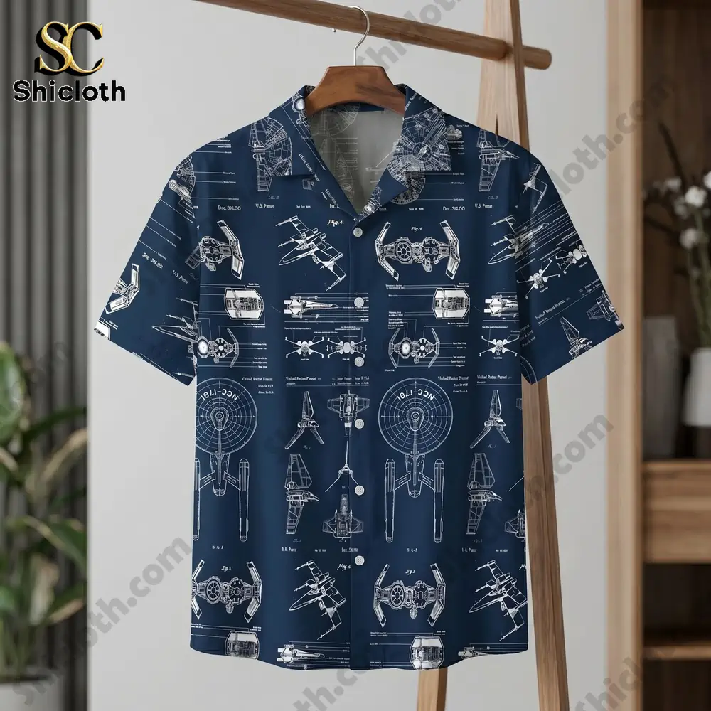 Front view of a navy blue Shicloth Hawaiian shirt with white spaceship schematics hanging on a wooden rack!