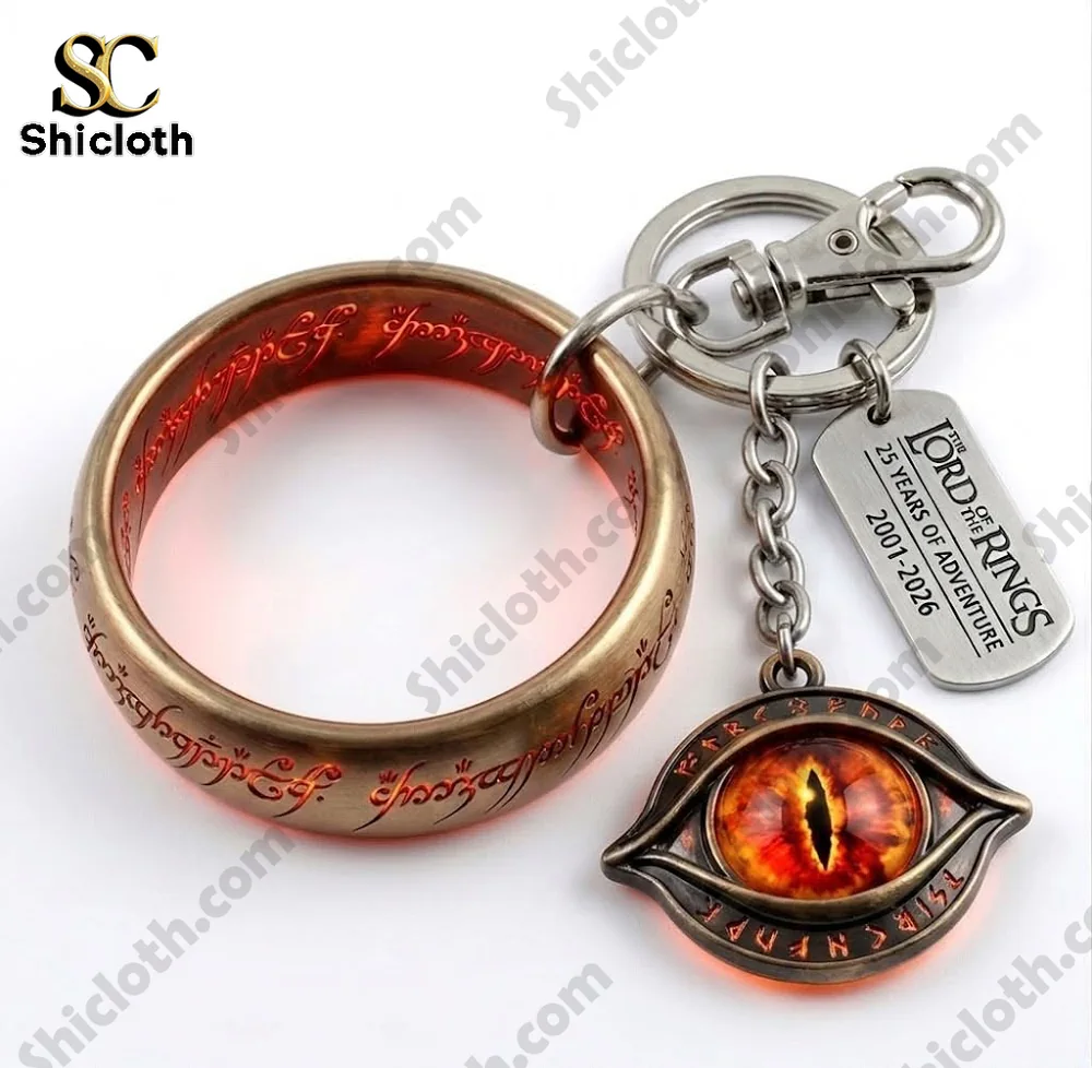 Close up of Shicloth ring and eye keychain set with detailed design