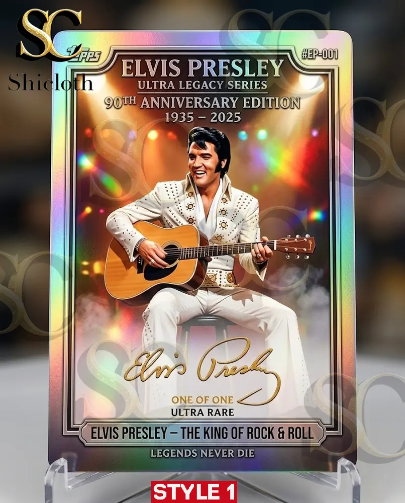 A highly decorative iridescent collectible card of Elvis Presley playing a guitar in his white jumpsuit, featuring detailed text.