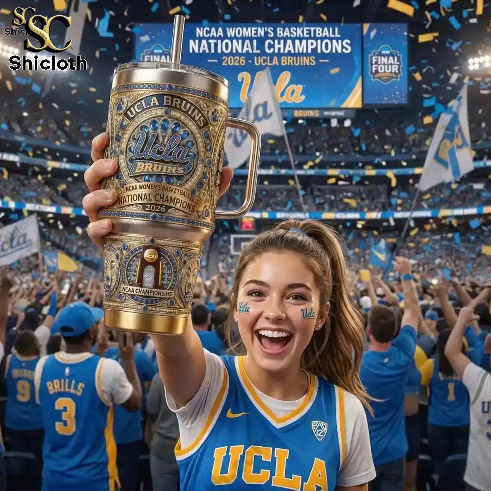 UCLA BRUINS National Champions NCAA 2026 With Handle Yeti Tumbler 3 UCLA fan holding up ornate tumbler in cheering stadium crowd