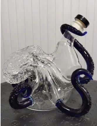 HOT Kraken Black Spiced Rum Whiskey Bottle 3 Side view of clear octopus whiskey bottle with dark blue tentacles!