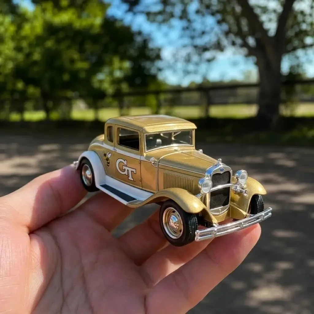 Hot Wheels Georgia Tech Yellow Jackets 134th Anniversary 1930 Ford Spec Cast Ford Model A Coupe Street Rod 3 Green toy car with flame decals on display
