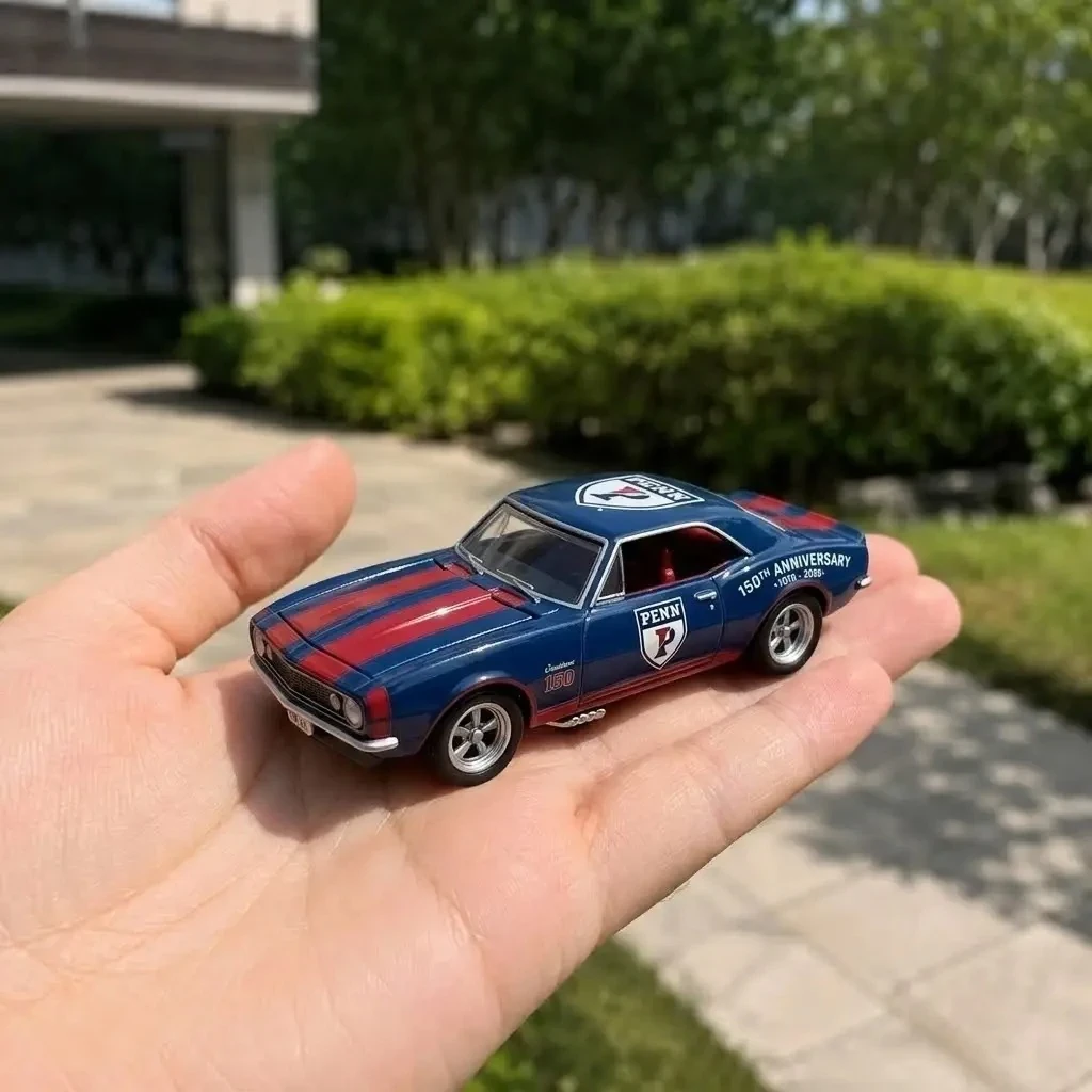 Hot Wheels University Of Pennsylvania Penn Quakers 150th Anniversary Chevrolet Camaro 3 Hot Wheels Penn Quakers 150th Anniversary Camaro held in hand
