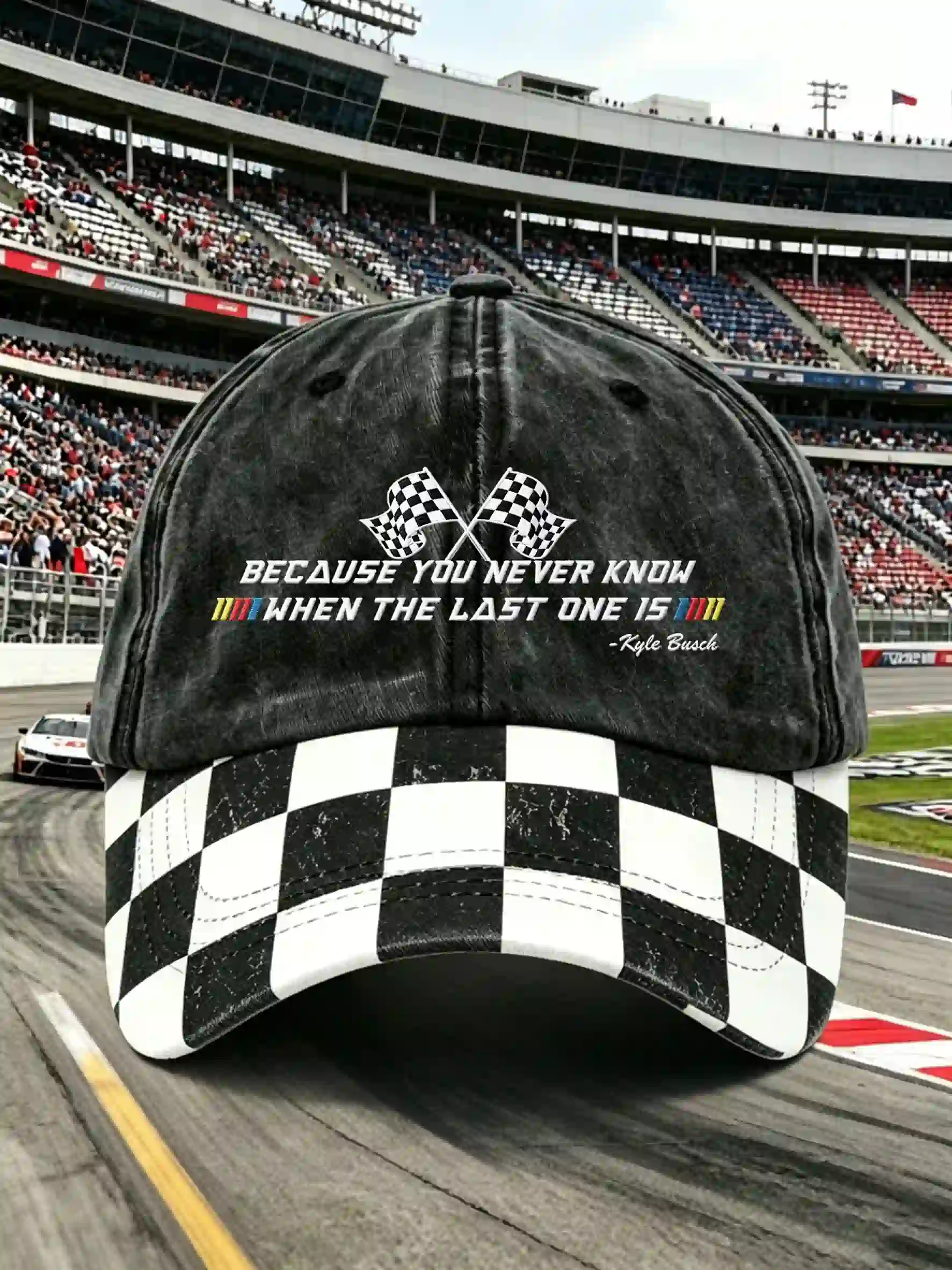 Distressed black baseball cap with checkered bill and Kyle Busch quote.