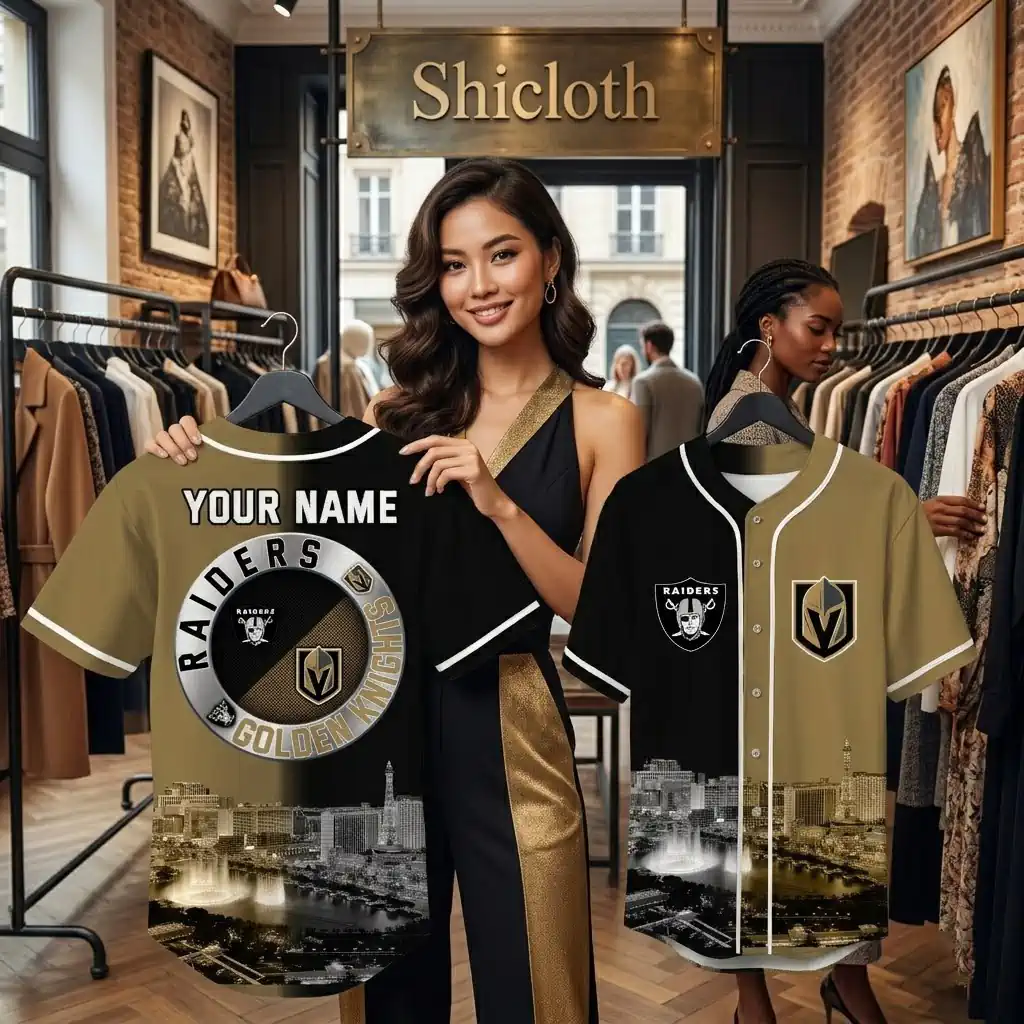 Woman displaying custom Raiders and Golden Knights themed baseball jerseys in a clothing store.