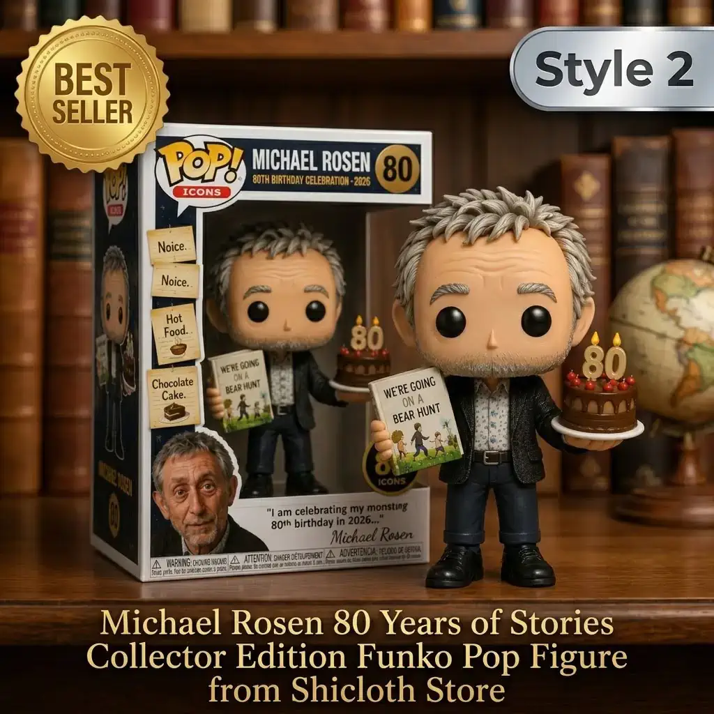 Michael Rosen vinyl figure wearing a black jacket holding a book and a birthday cake next to its packaging box on a wooden table!