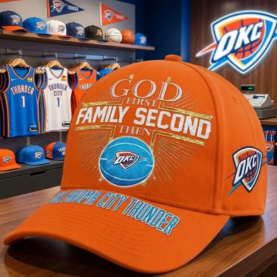 Oklahoma City Thunder God First Family Second Baseball Cap 6 Orange Oklahoma City Thunder themed baseball cap with religious text on display in a team store.