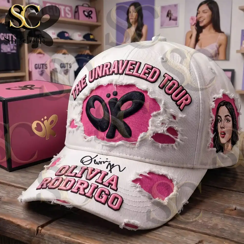 Close view of Olivia Rodrigo tour cap with pink distressed design