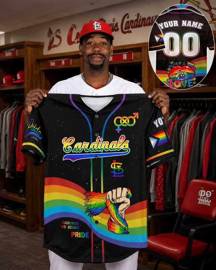 A professional baseball player displaying a custom St. Louis Cardinals pride jersey with rainbow designs and LGBTQ+ symbols.